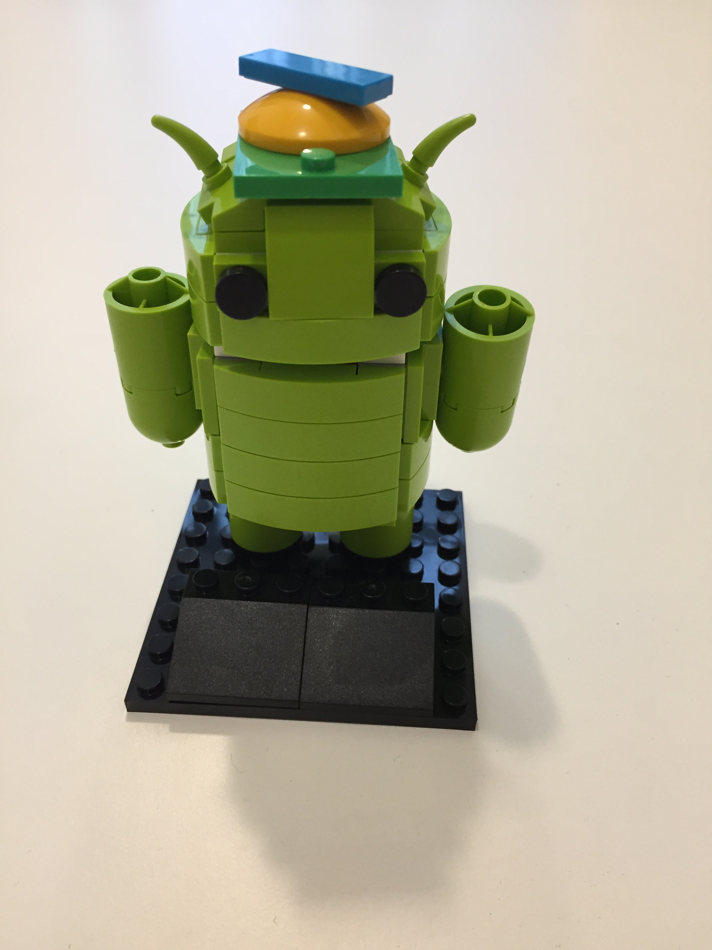Android robot assembled from blocks