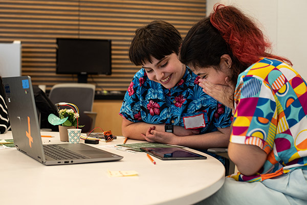 Members of a Rhode Island chapter of Girls Who Code tested <br>soil moisture sensors and AI analysis blocks with house plants.
